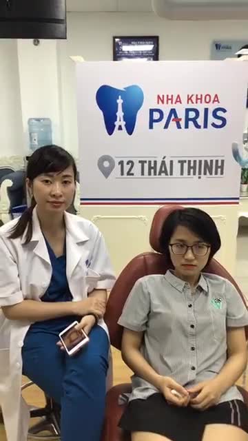 Phạm Thị Mai Hương gắn mắc cài kim loại thường của BS Văn Huyền Giang tại nha khoa Paris chi nhánh 12 Thái Thịnh