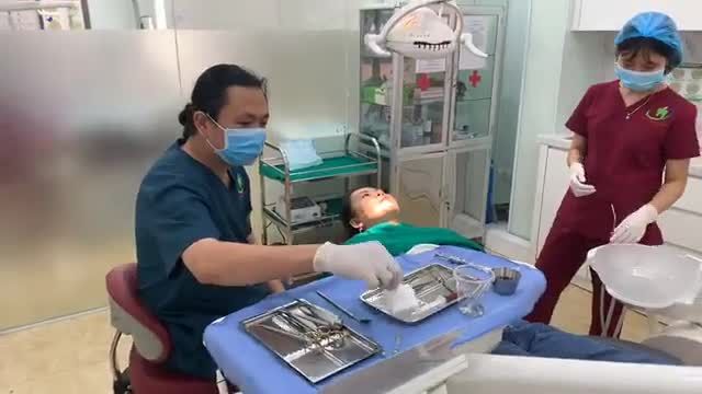Nhổ răng khôn mọc lệch gây đau, nhồi nhét thức ăn R28,38 tại Nha Khoa Thuỳ Anh cơ sở Hà Nội.