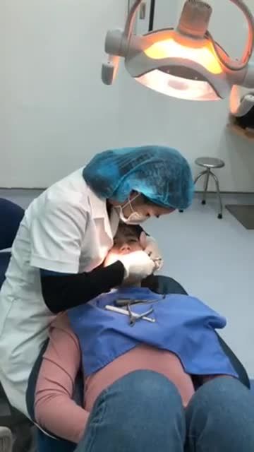 GẮN NIỀNG RĂNG MẮC CÀI KIM LOẠI TỰ BUỘC TẠI NHA KHOA PARIS VINH