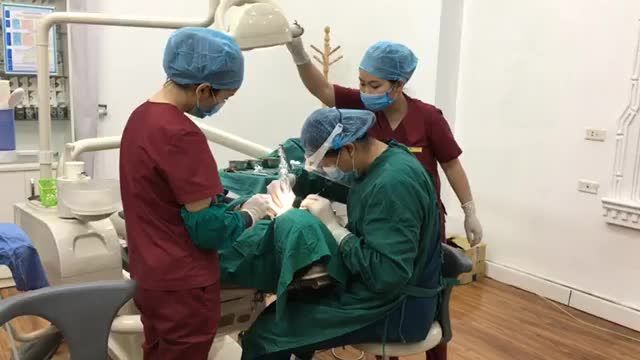 Trồng lại răng 45 bị mất theo phương pháp cấy chân răng nhân tạo implant,