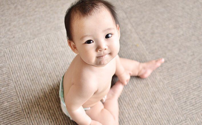 Trẻ 7 tháng tuổi: Phát triển thể chất, vận động, nhận thức và cảm xúc