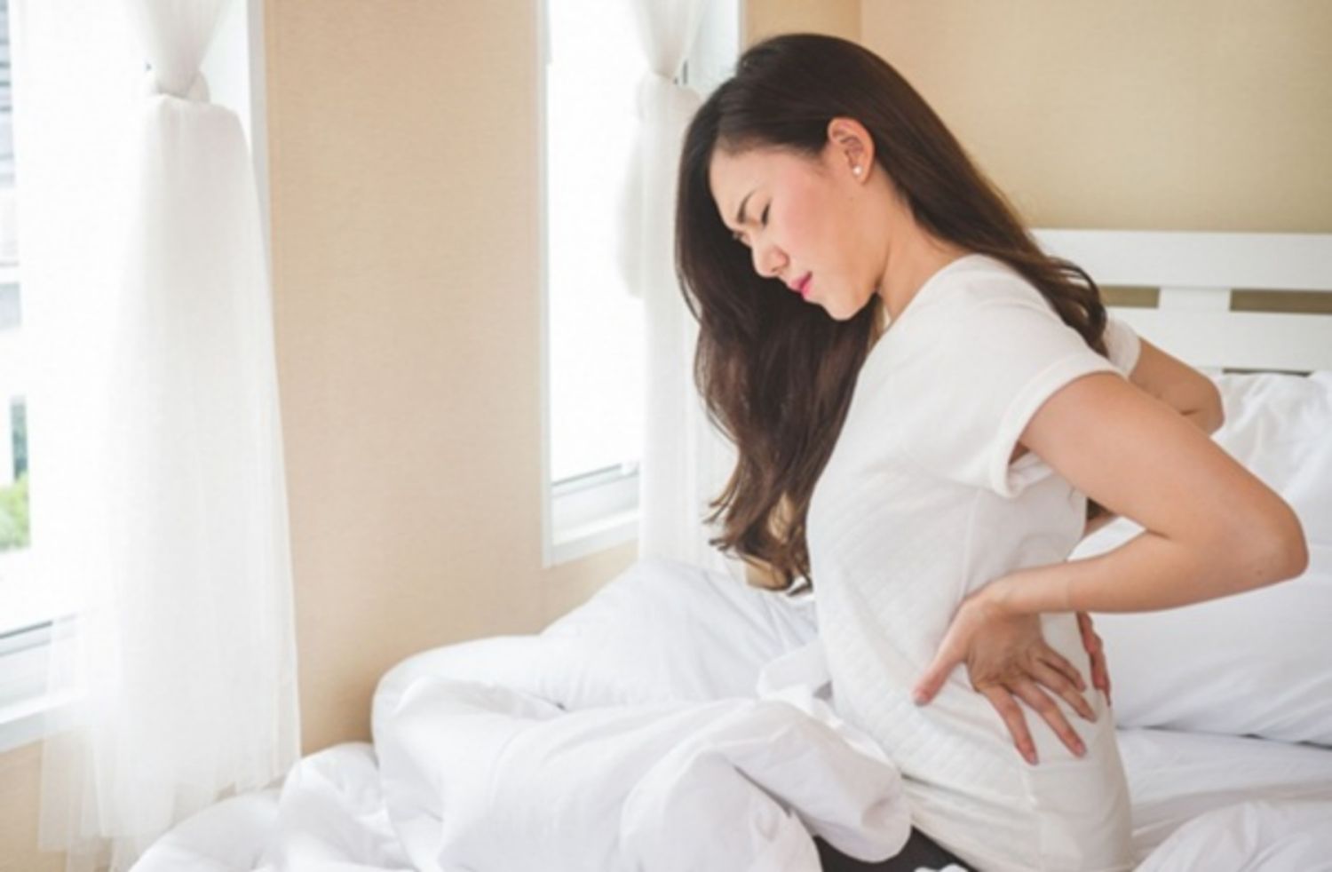 Làm thế nào để giảm đau lưng khi có kinh nguyệt?